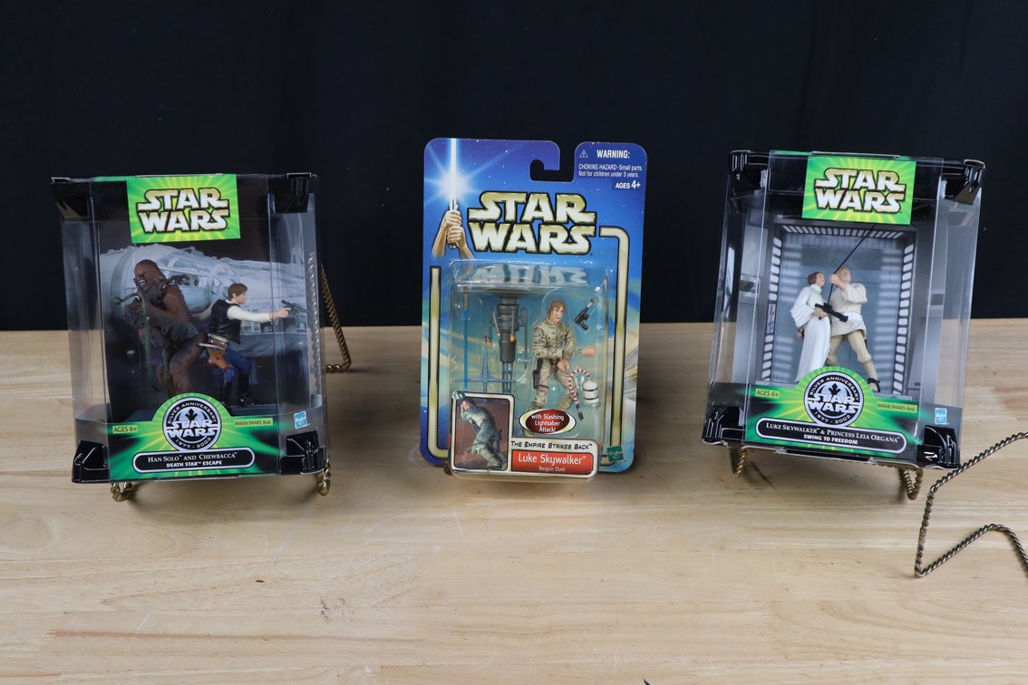 (3) Star Wars Silver 25th Anniversary Luke Skywalker and Princess Leia Swing to Freedom; Star Wars Silver 25th Anniversary Han Solo and Chewbacca Death Star Escape; and  Emire Strikes Back Luke Skywalker