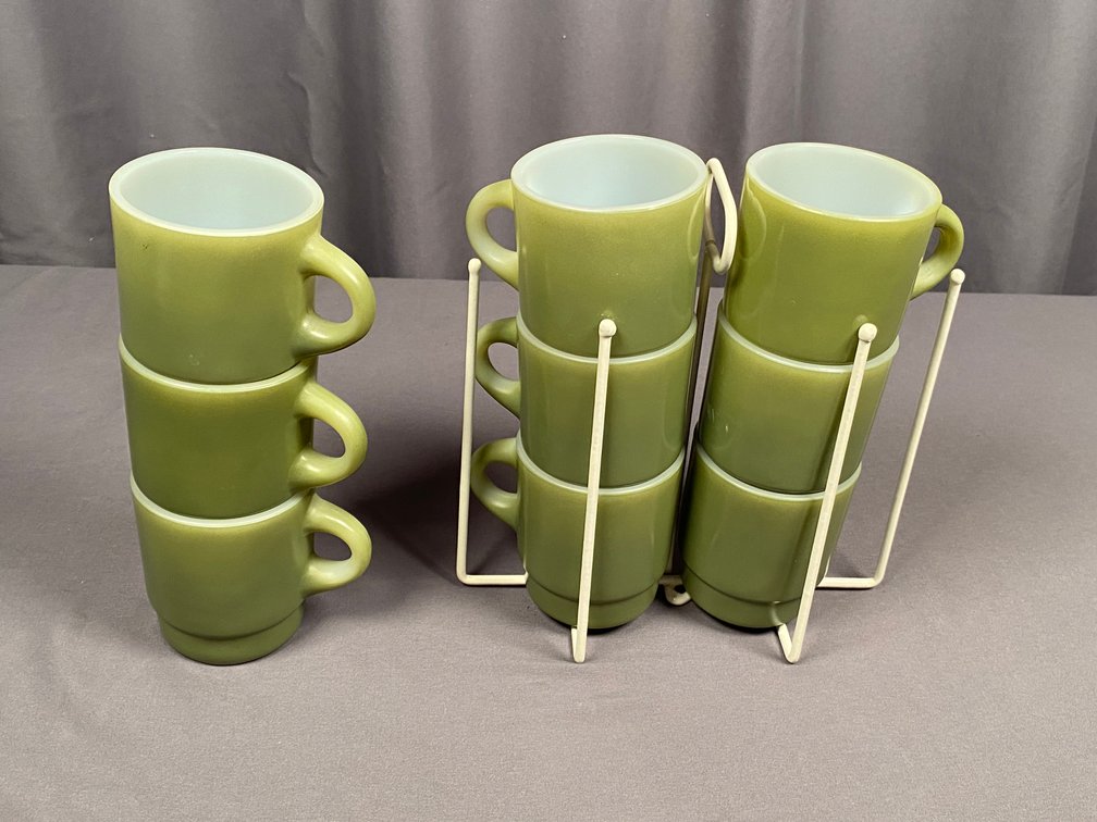 Collection of (9) Olive Green Fire King Stackable Coffee Mugs With Rack
