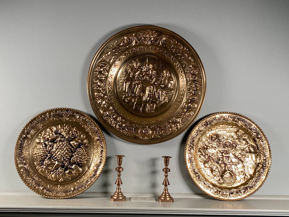 Collection of (5) Decorative Brass Pieces Including (2) Candlesticks and (3) English Trays/Wall Art
