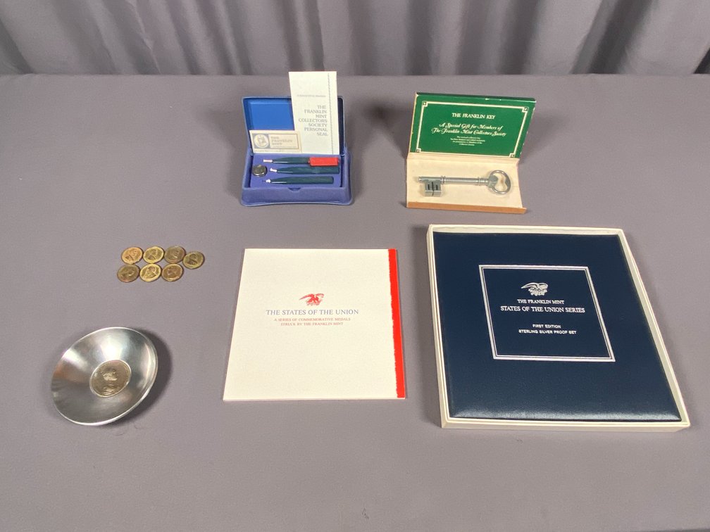 Franklin Mint Collectors Society Franklin Key, Personal Seal Seat, State of The Union Series Coin Book, (7) Commemorative Presidential Coins, and Italian Stainless Bowl with 1936 Coronation Medal
