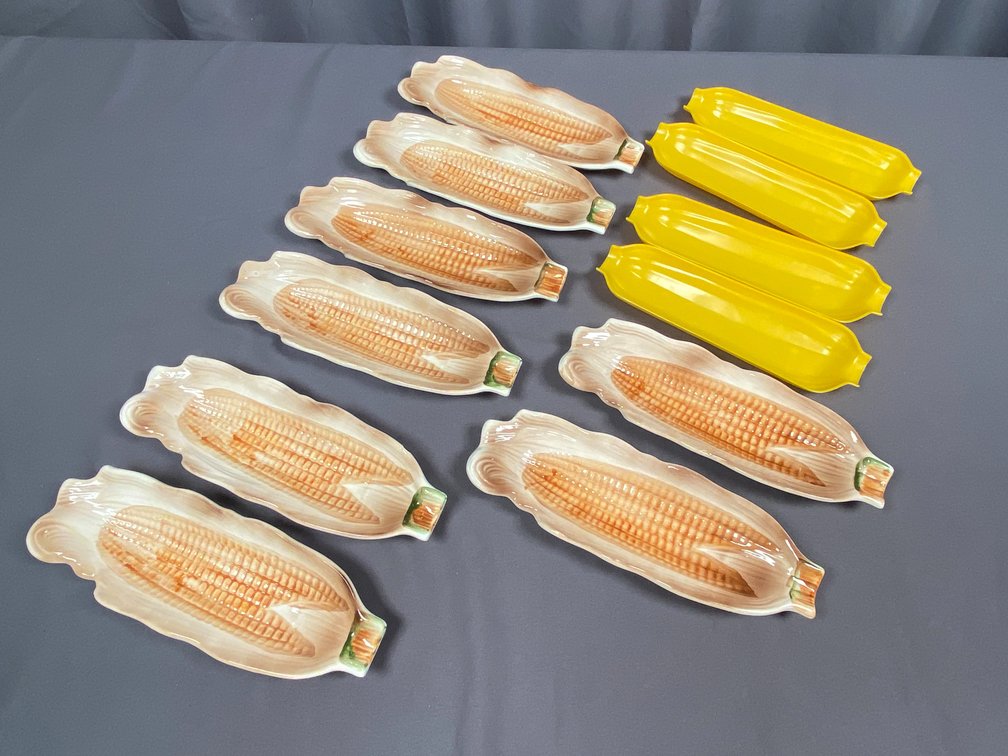 Assortment of (12) Corn Holders Including Plastic and Ceramic Varieties