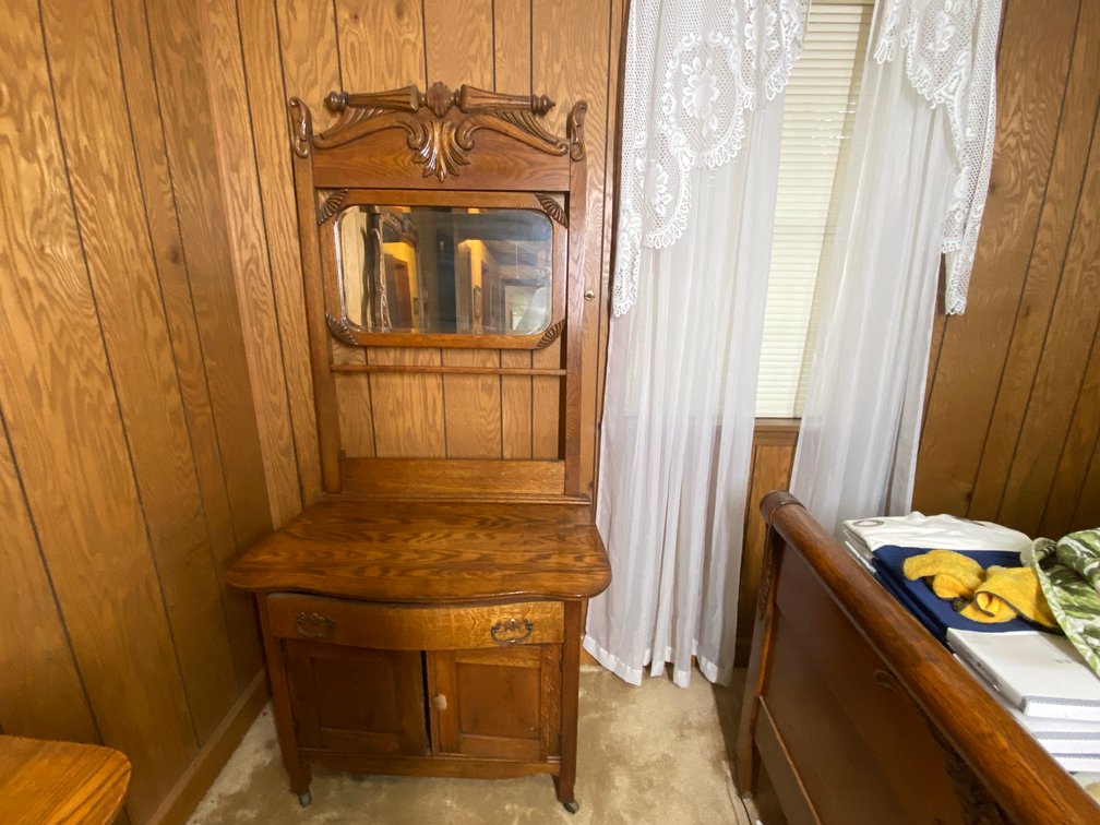 Antique Oak Washstand with Beveled and Swivel Mirror, and Towel Bar.