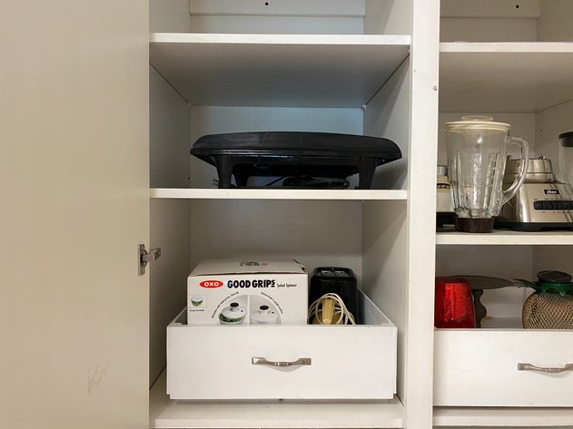 Image for Contents of Kitchen Cabinet Including (2) Shelves