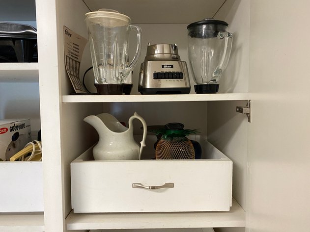 Image for Contents of Kitchen Cabinet including (2) Shelves