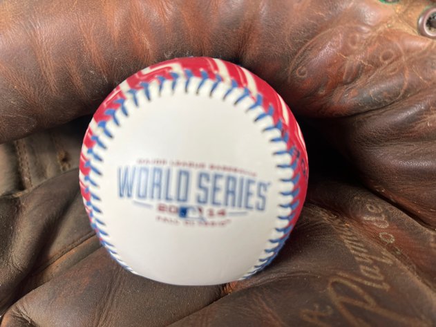 Image for Collection of Baseball Memorabilia Including Signed Vintage Leather Gloves, 2014 World Series Baseball, Who's Who Guides, Mickey Mantle Ornamnet & Stadium Seats