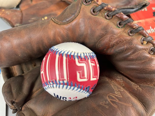 Image for Collection of Baseball Memorabilia Including Signed Vintage Leather Gloves, 2014 World Series Baseball, Who's Who Guides, Mickey Mantle Ornamnet & Stadium Seats
