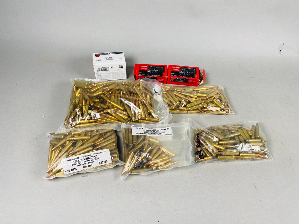 Assortment 450 +/- 223 remington, live rounds and casings