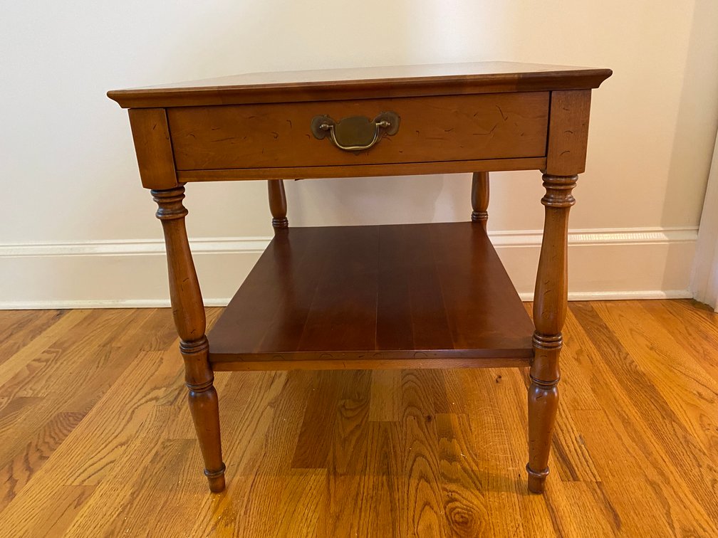Vintage Wooden Two-Tier Side Table Featuring A Single Drawer And Turned Spindle Legs.