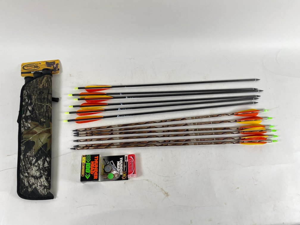 (1) Tarantula Quiver with (6) Easton 2213 Superlite Arrows & (6) Buck Buster 60/75 Arrows, (1) 6 count Box of NAP Thunder Head 100 Arrow Heads, and (1) Bohning Tex-Tite Bowstring Wax