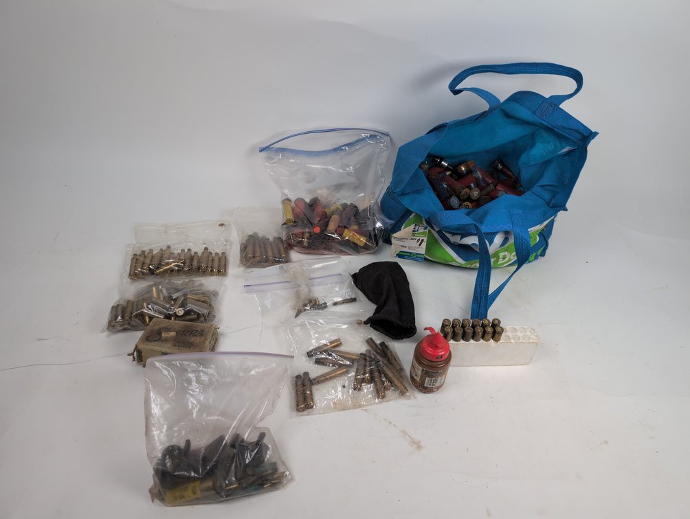 Assortment of Live Ammo, Cassings, and Bullets of Different Calibers & An Assortment of Gun Parts