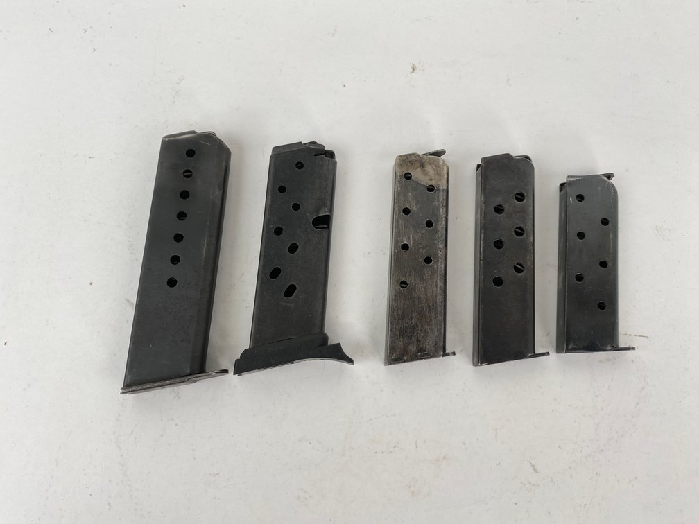 Collection of Pistol Magazines Including 9mm and 32 Colt