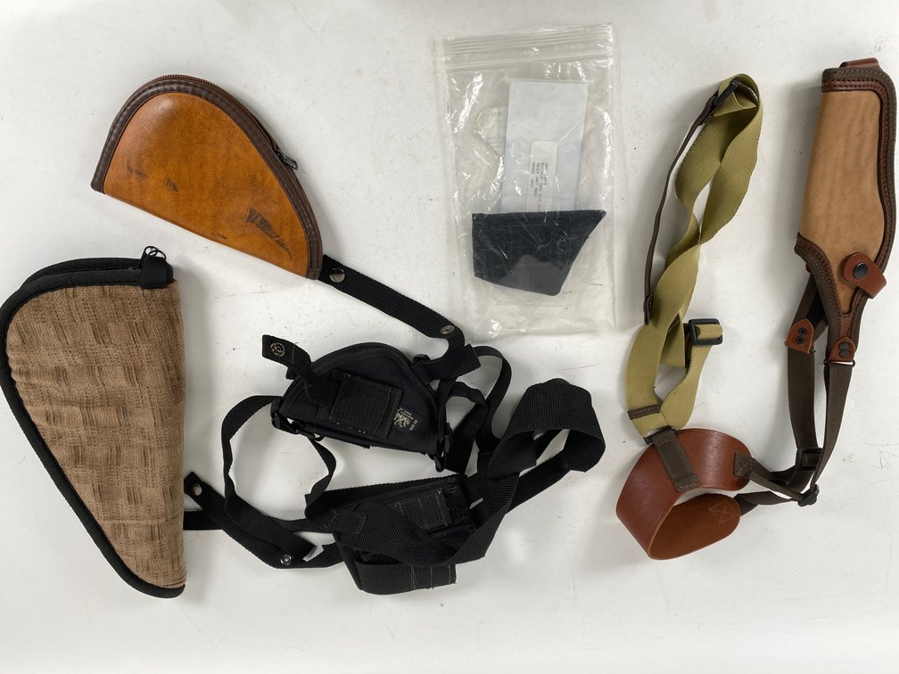 Assortment of Nylon, Fabric, and Leather Pistol Cases, Holster Harnesses, and Holster