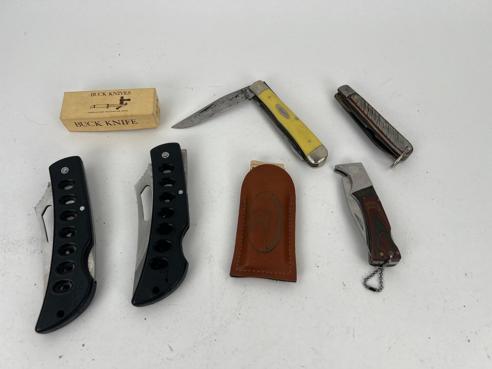 Collection of Vintage Folding Knives and Sharpening Stone. Including Case and Buck Knives