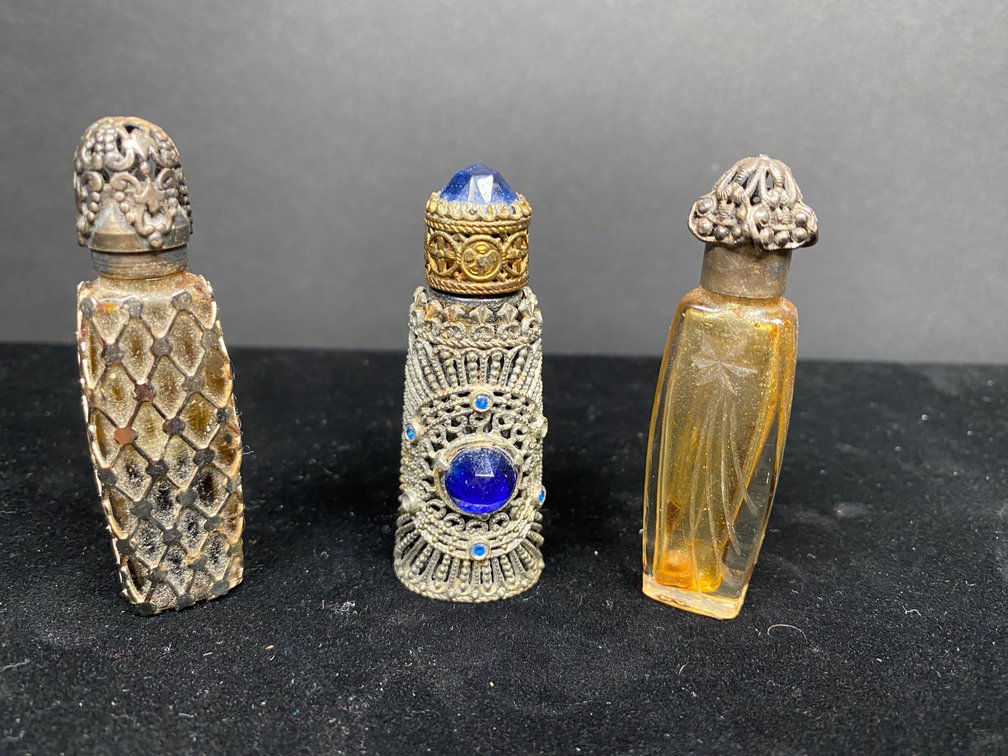 (3) Vintage Art Deco Sterling Filigree Mini Perfume Bottles Including "Tenacious" French Parum with Dobber, Estee Lauder and Caged Irice Czech Jeweled Mini Bottle