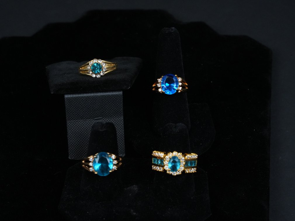 (4) Gold Plate Costume Jewelry Rings with Blue Glass Stones