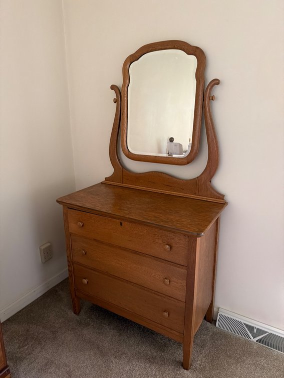 Antique Victorian-style oak dresser with swivel mirror
