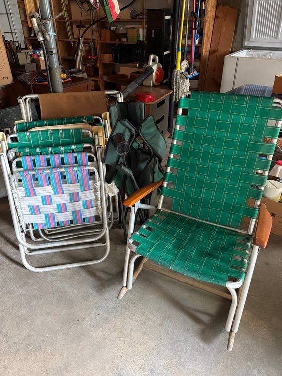 7 folding chairs and a cot