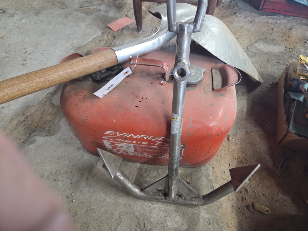 Boat gas can, shovel scoop, and anchor