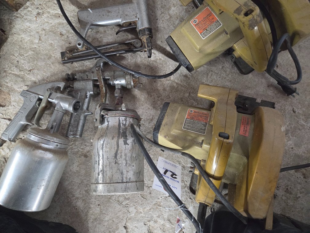 Spray guns, nail guns and electric skill saw (condition unknown)
