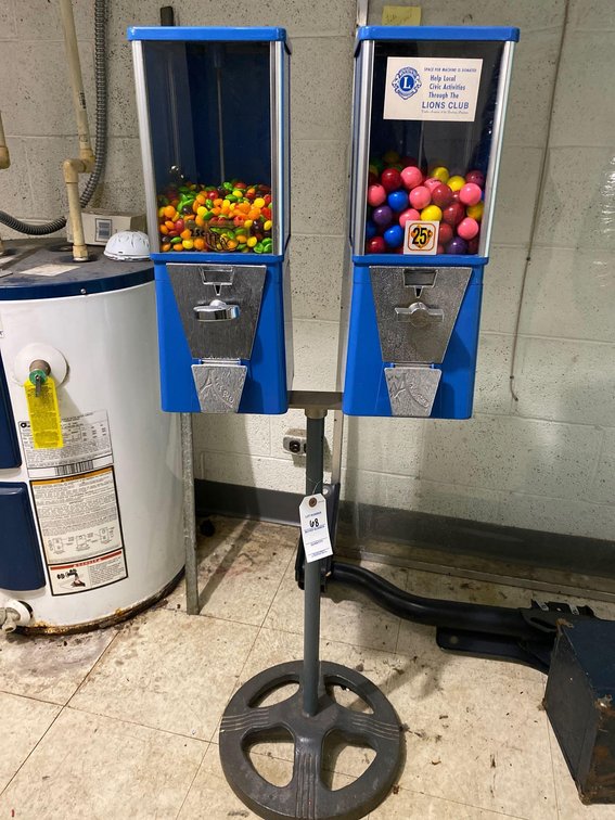 QUARTER OPERATED CANDY MACHINE
