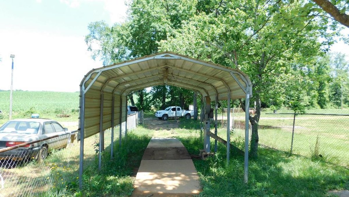 Metal carport (to be removed) 20 x 12