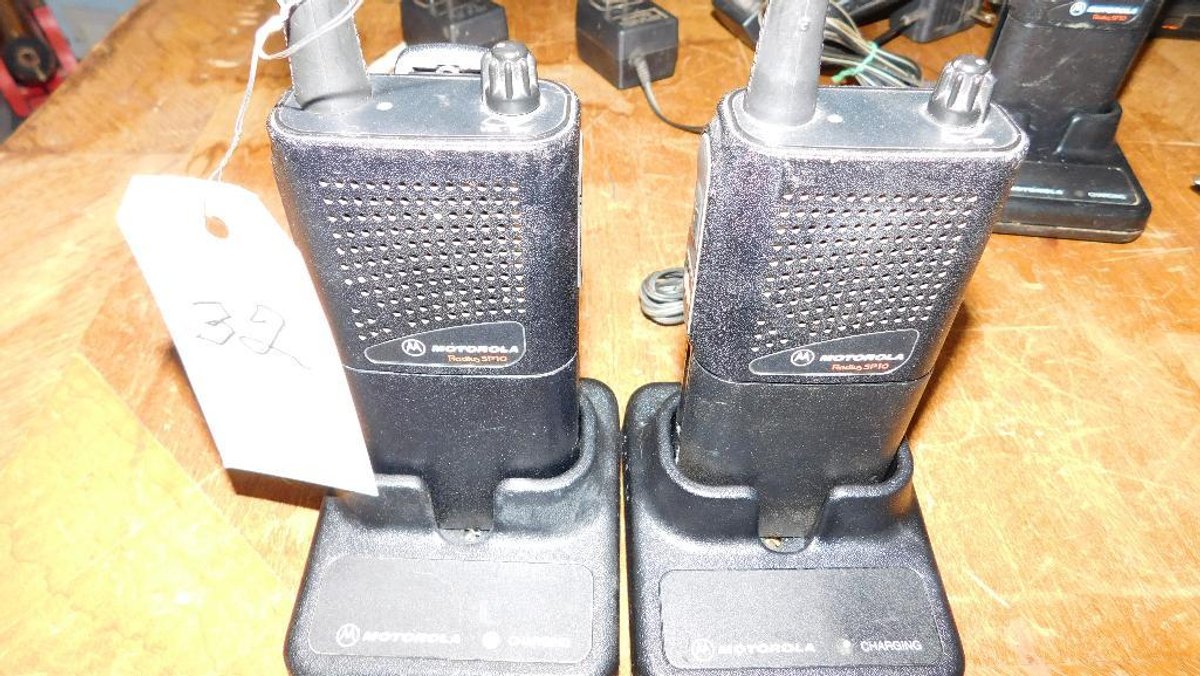 2 Motorola hand held radios w/chargers