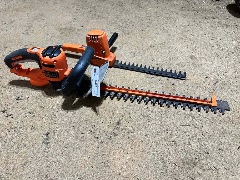 2 Black and Decker electric hedge trimmers