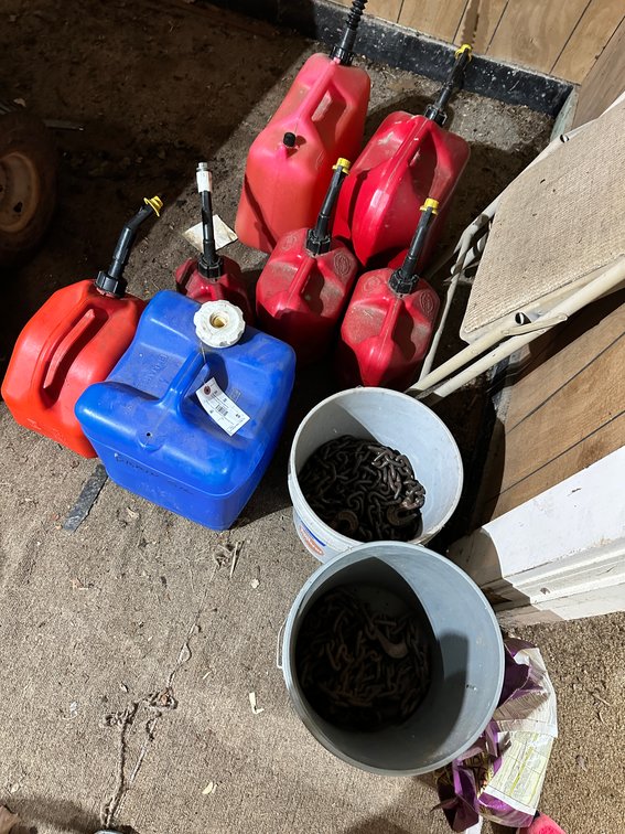 Plastic Gas Containers and Metal Chain