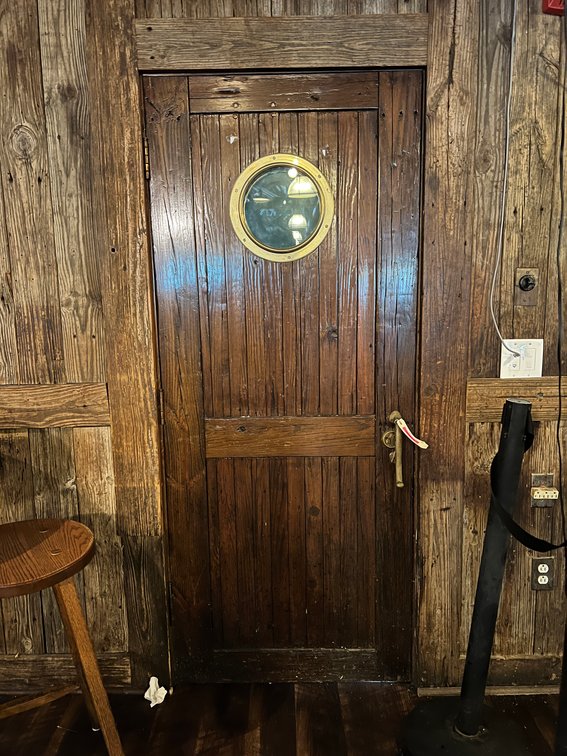 Wood ships door with porthole