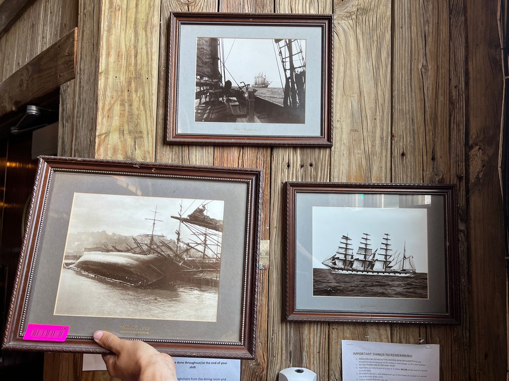3 framed ship photographs