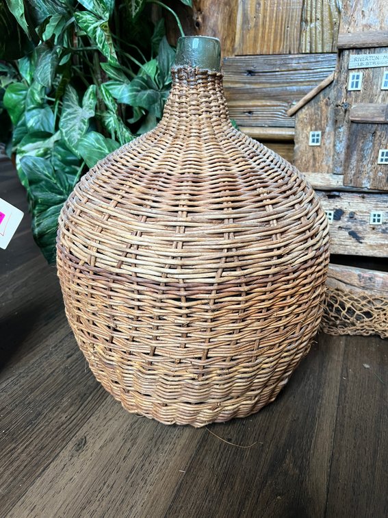 Glass jug with wicker basket