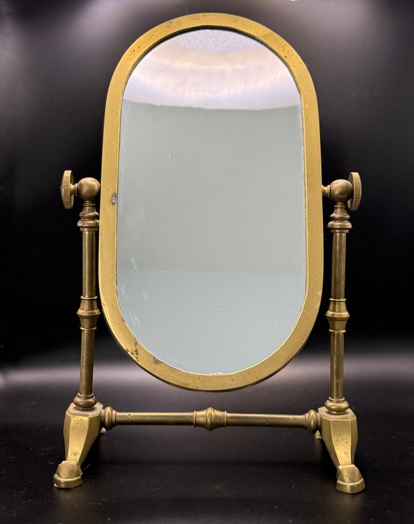 Oval tilt mirror