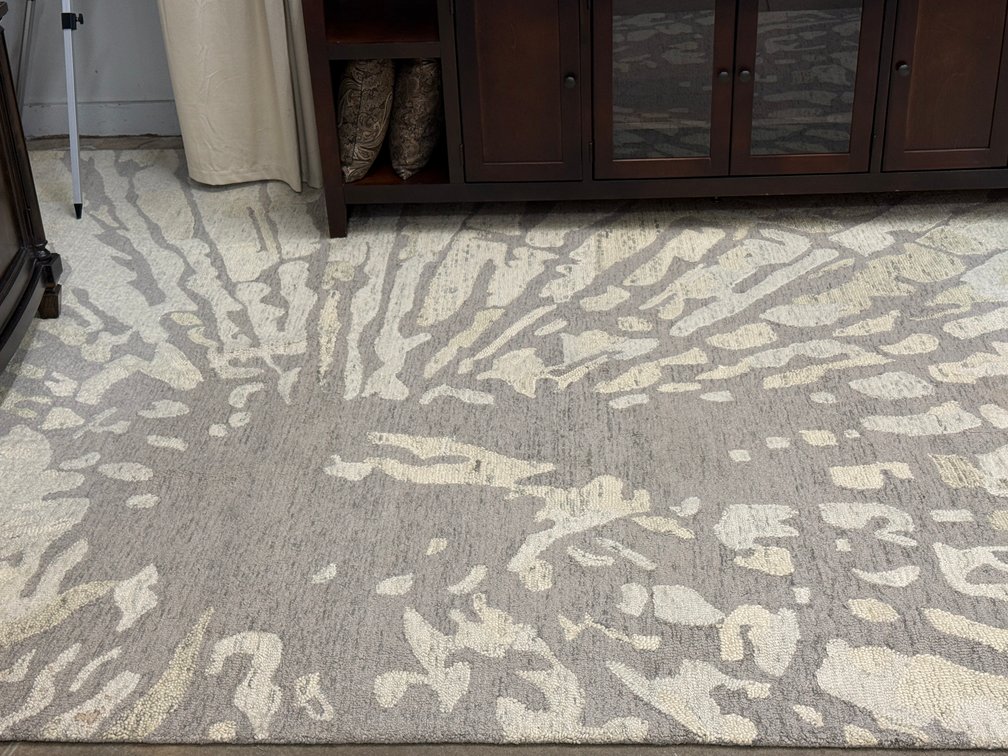 Large wool area rug.