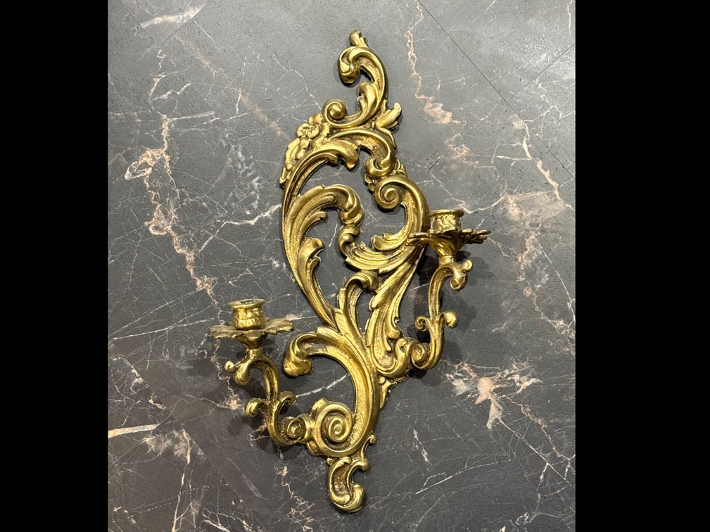 Cast bronze wall candelabra
