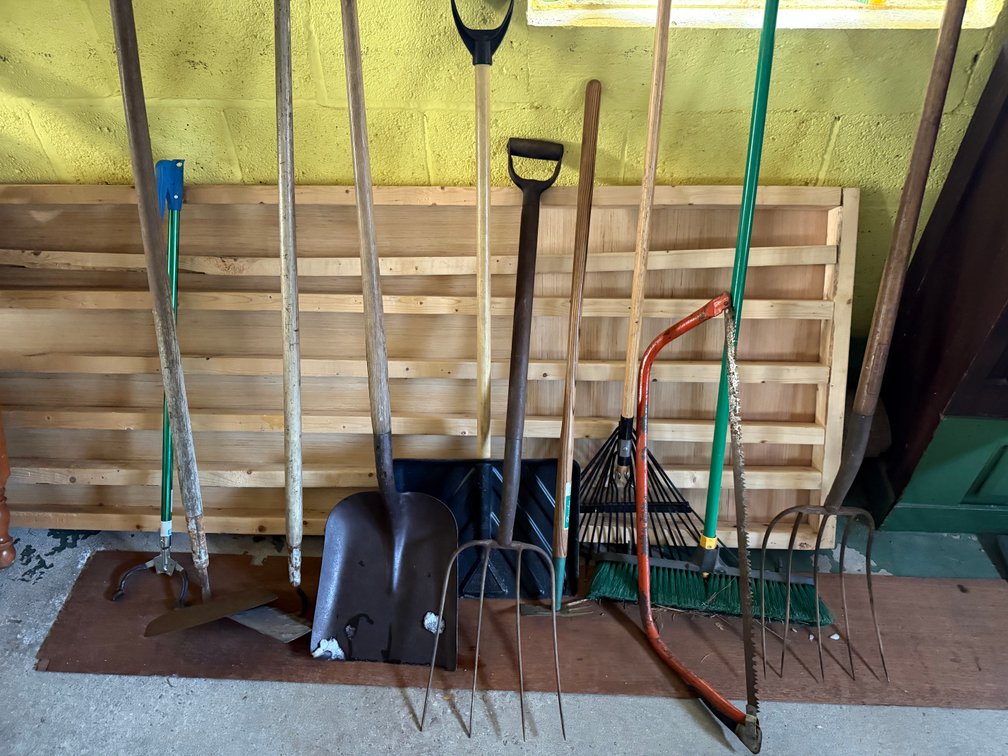 Hand and garden tools with tubs.