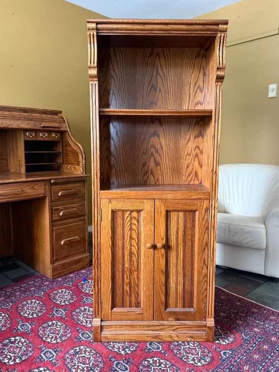 Oak bookcase with cabinet bottom