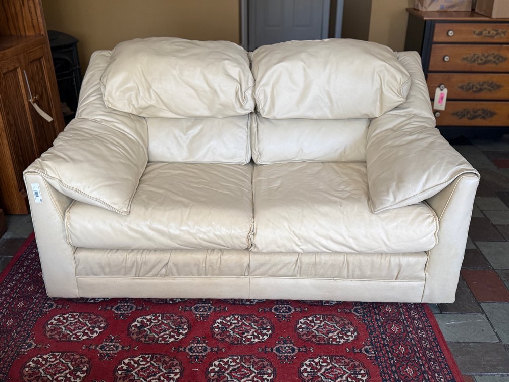 Cream colored leather couch