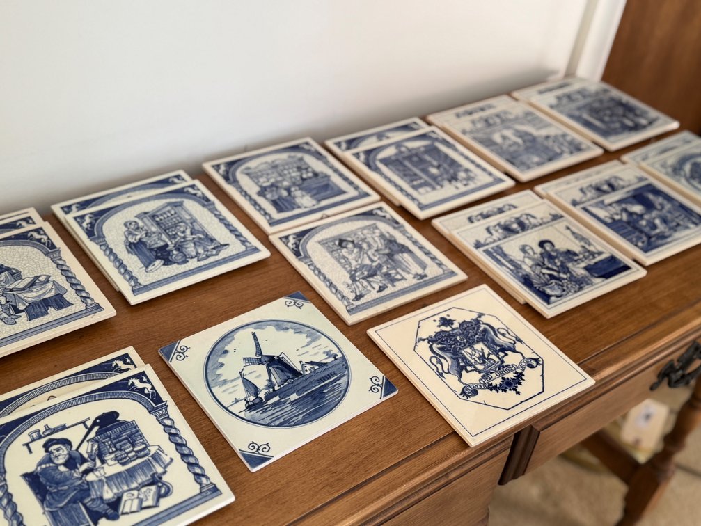 23 painted delft tiles