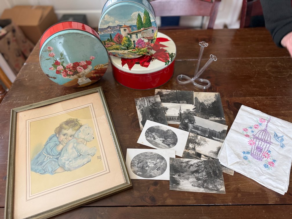 Vintage print, tins, and postcards