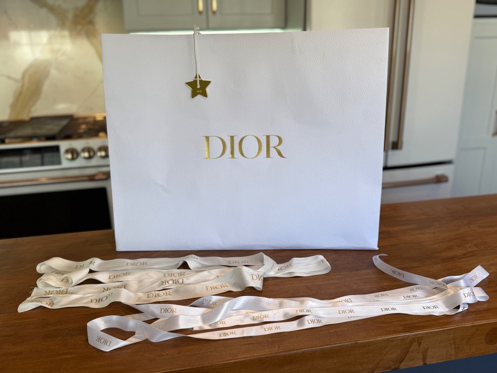 Dior bag, ribbon & receipt