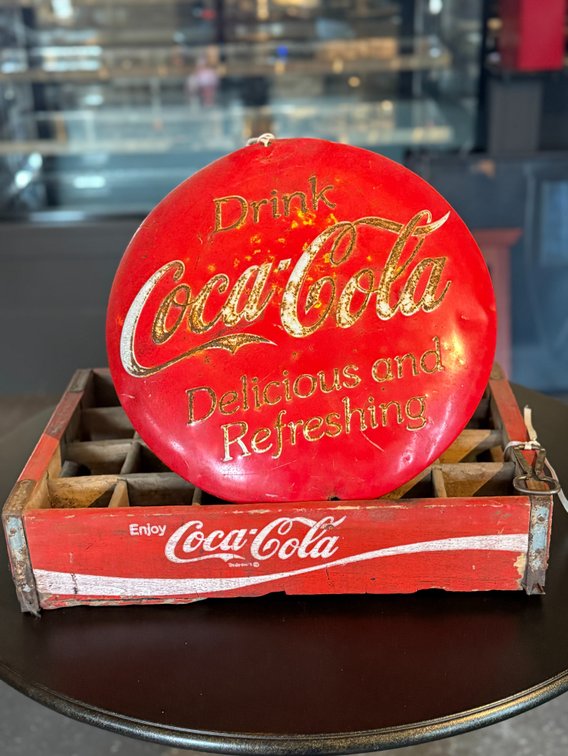 Antique Coca-Cola sign and crate