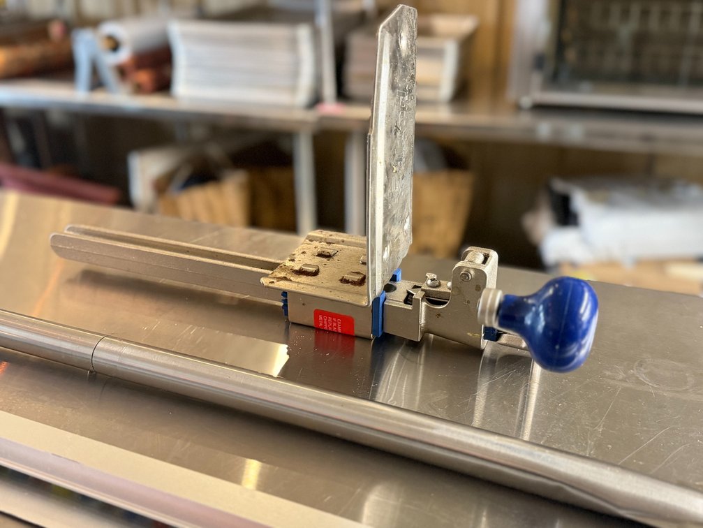 ticket rails, paddle, and can opener