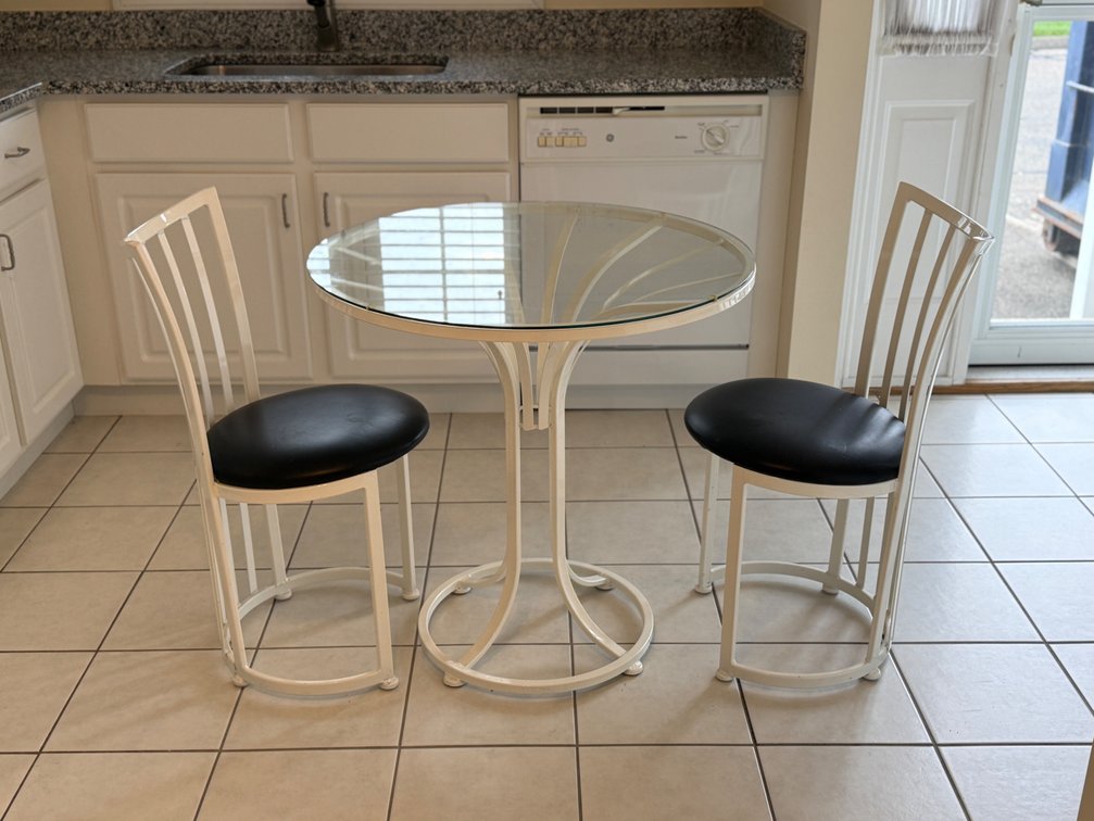 Glass table with matching chairs