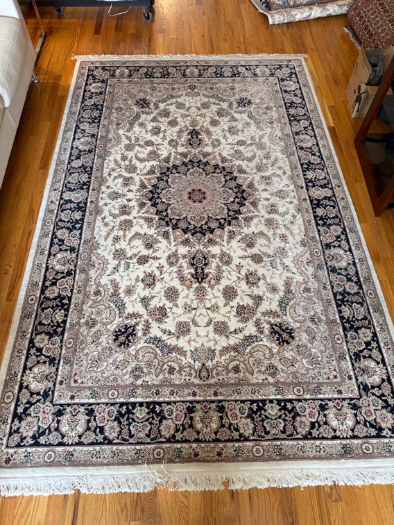 70” x 109” wool rug