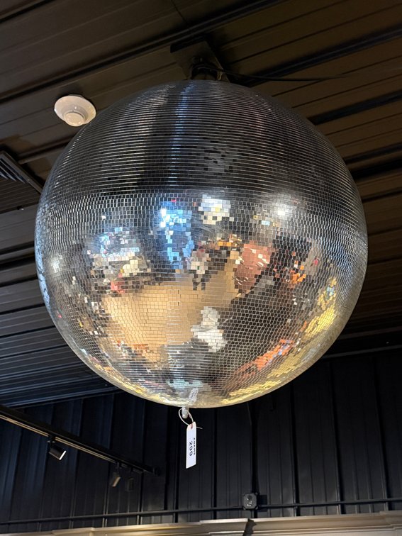 Rotating mirrored disco ball