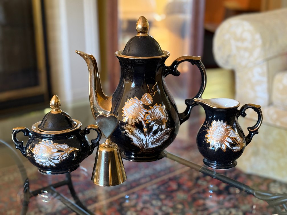 Black Glazed Ceramic Tea Service and Metal Bell