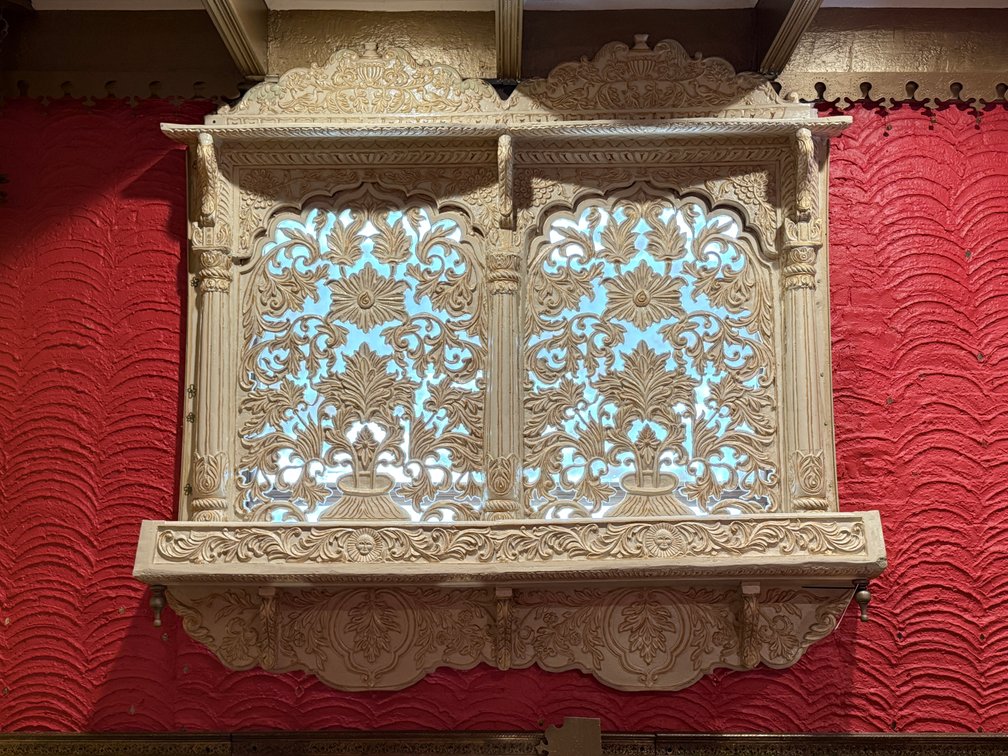 Jali carved double window screen