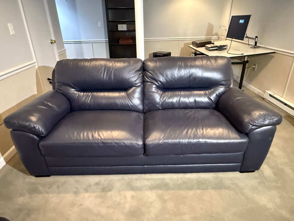 Dark blue gray leather couch 