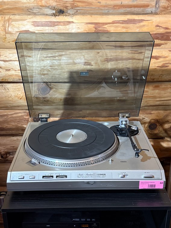 Fisher turntable with Grado stylus & open front cabinet. 