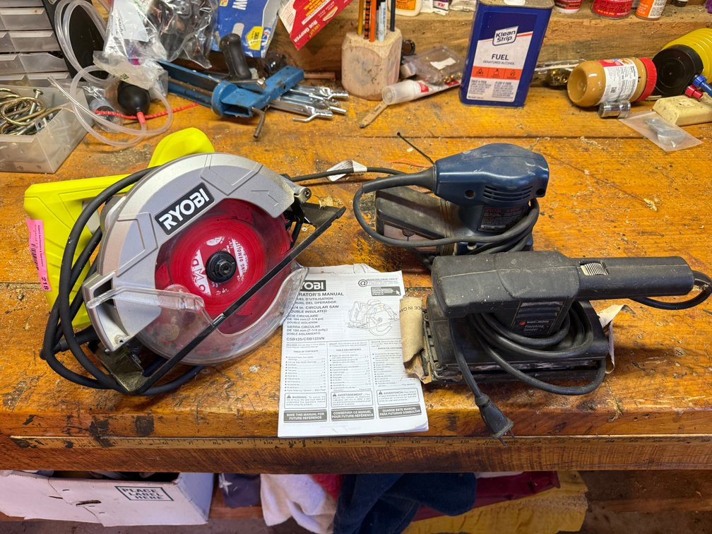 2 palm sanders and a circular saw